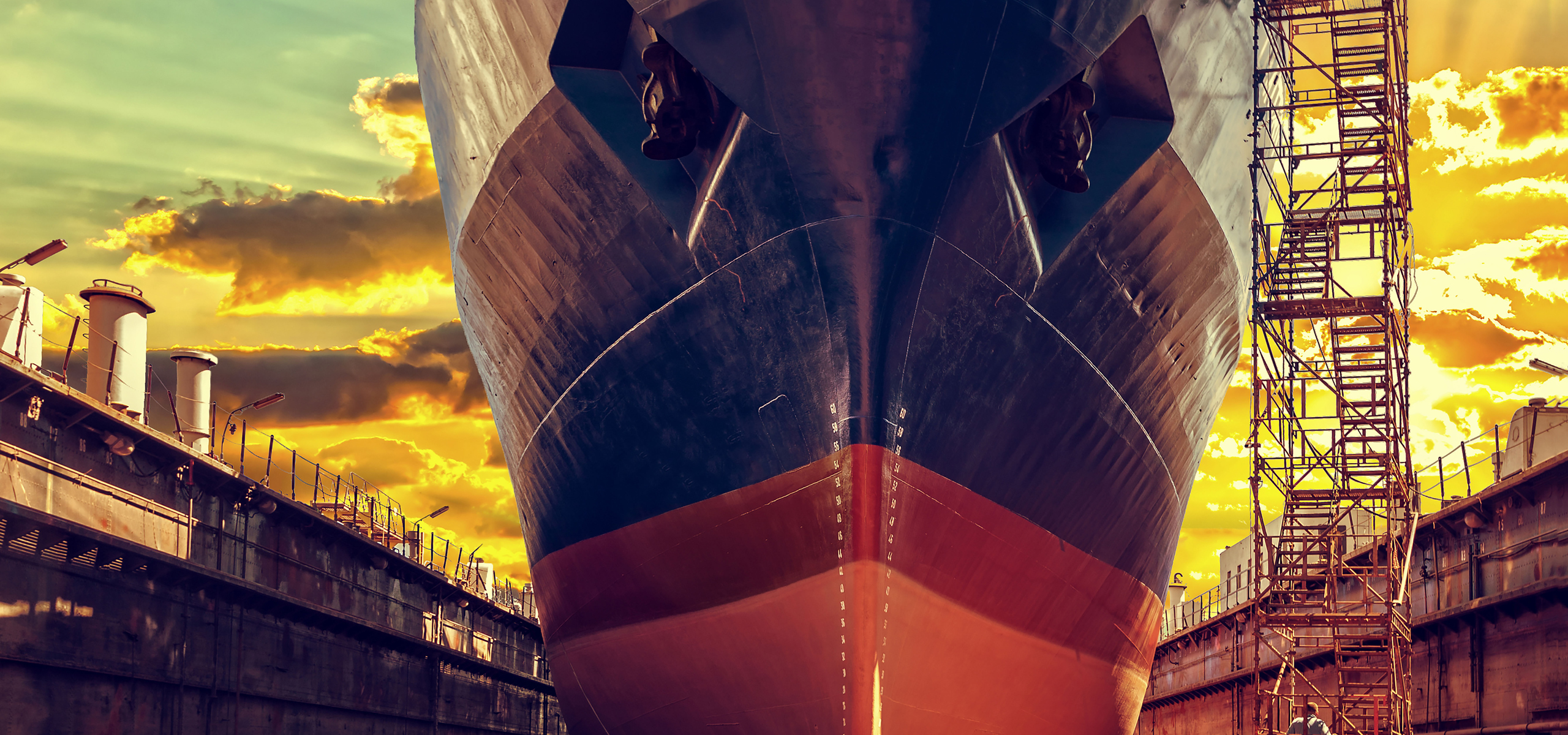 Ship in dry dock at sunrise